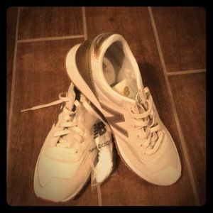 New balance white and gold sneakers